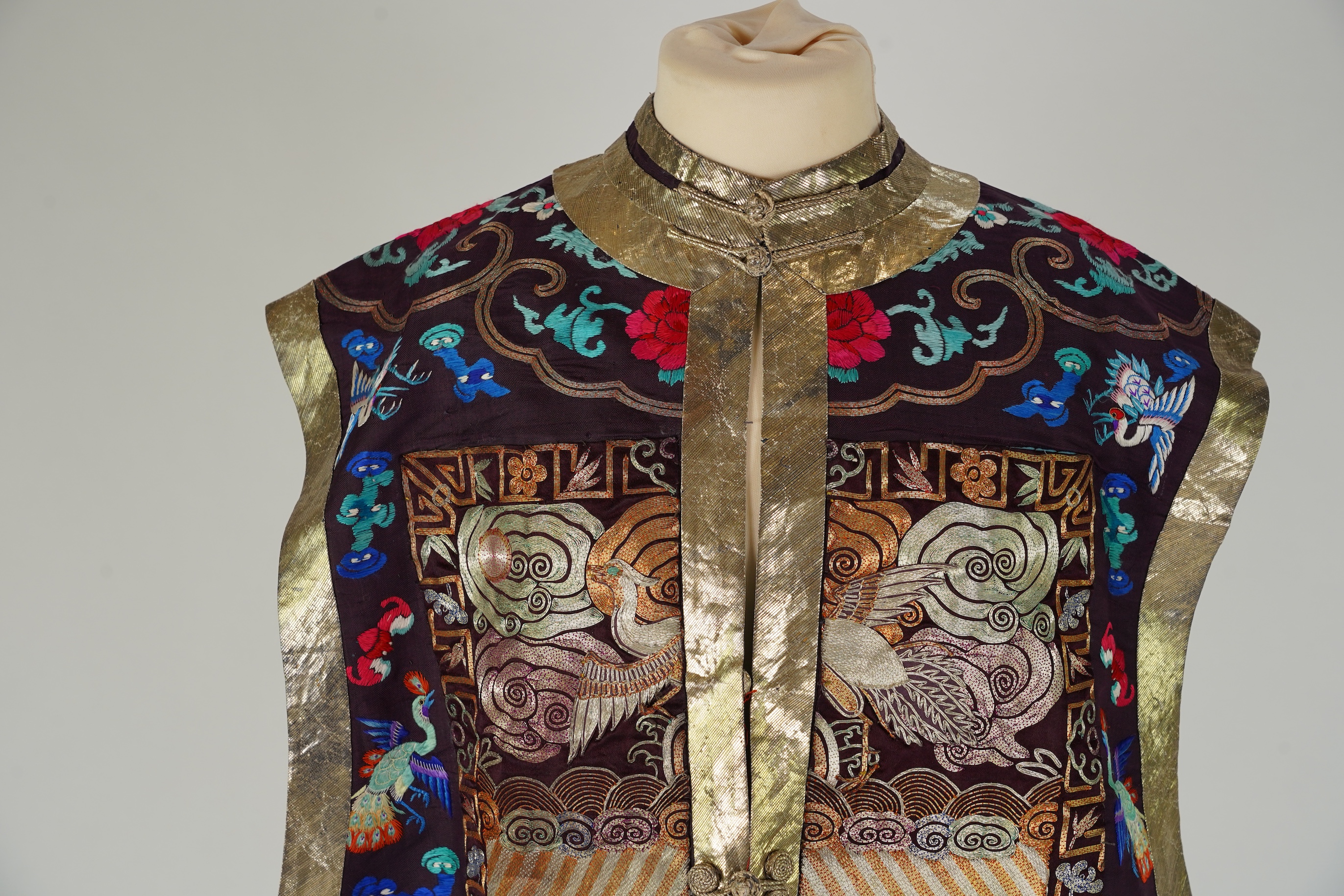 A Chinese embroidered silk vest, xiapei, early 20th century